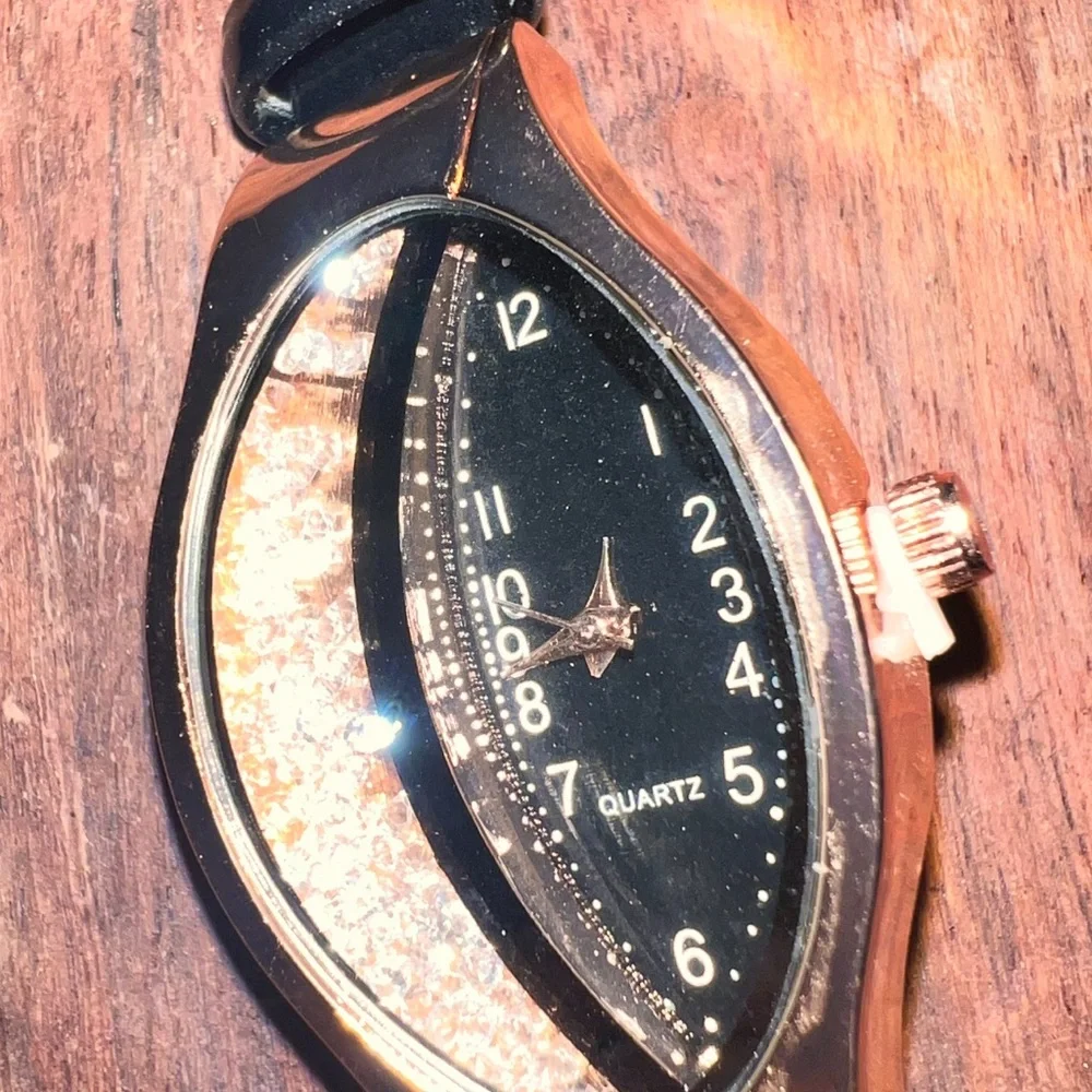 fashion watch with cz floating inside watch face ,‎ very beautiful